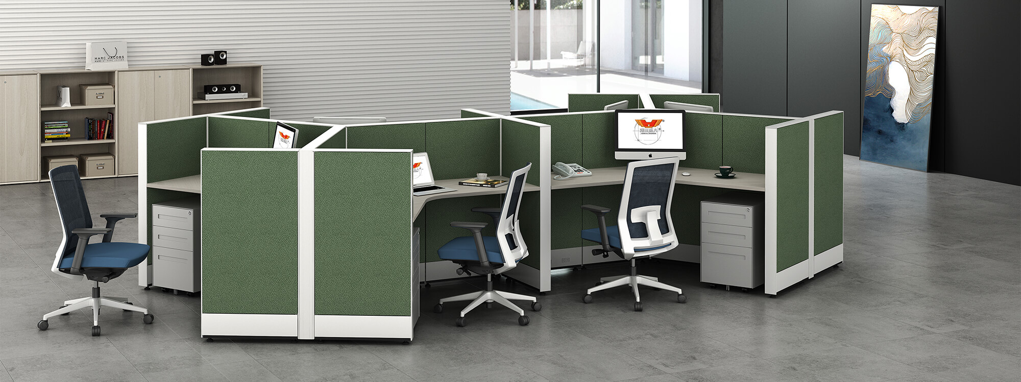 Multi-person cubicles in green accommodate each employee with a separate space that reduces distractions and increases productivity. 