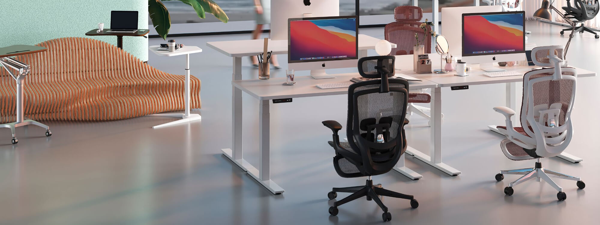 The three - and two-person workstations in the office have five black office chairs.
